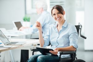 Happy Office Worker In Wheelchair